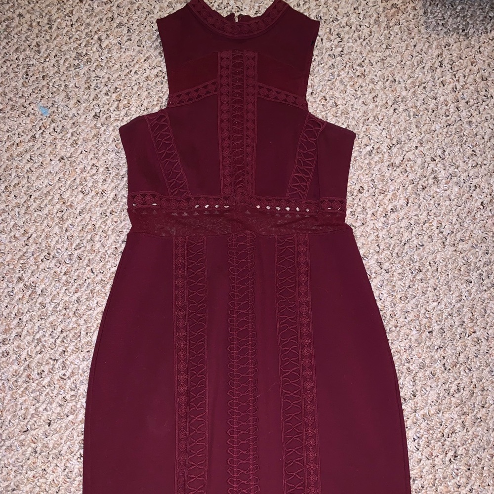 Maroon mid-thigh dress.